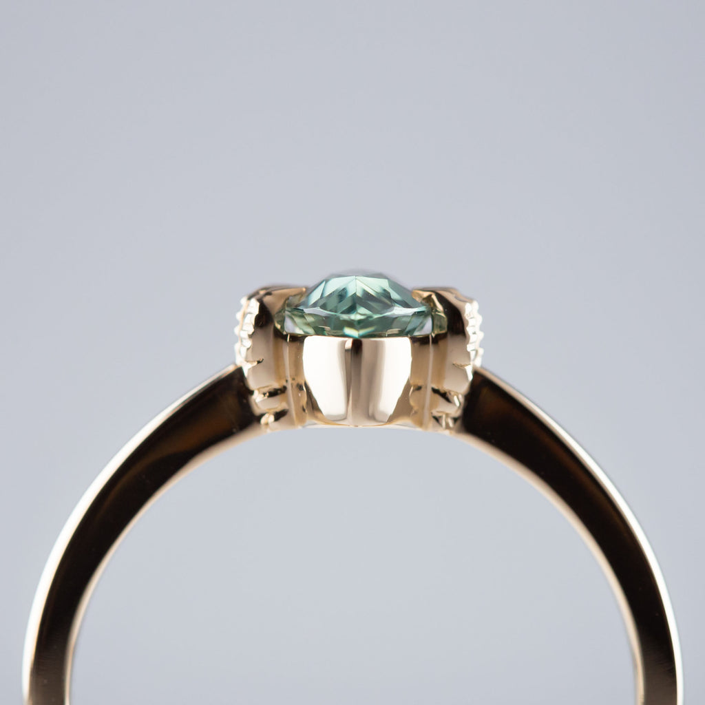 1.06 carat Iceberg Green Sapphire Marquis Baby Dragon Claw ring in 9 carat Gold