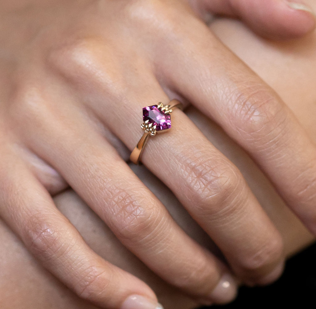 1.75 carat Vivd Pink Garnet Hexagon Baby Dragon Claw ring in 9 carat Gold