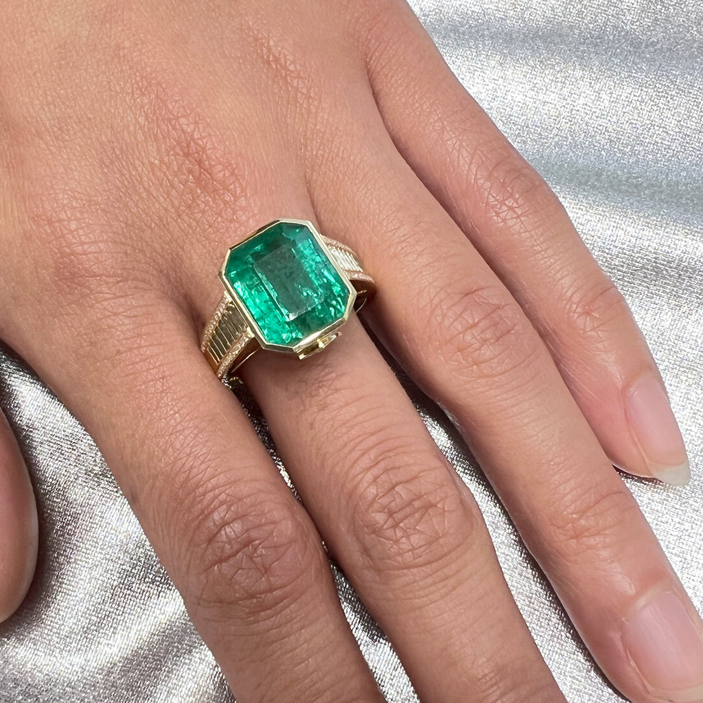 7.41 carat Emerald 'Stairway to the Emerald Dance Floor' ring in solid 18 carat Yellow Gold