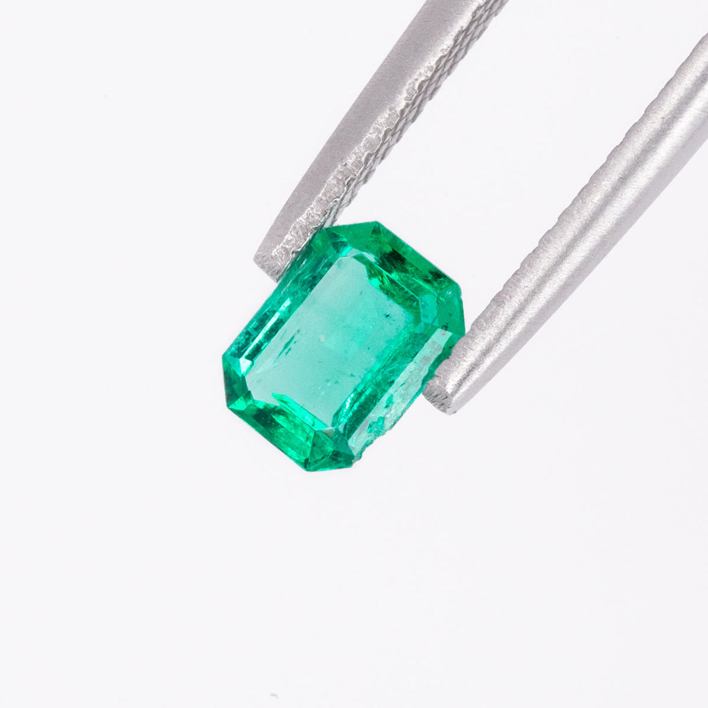 Vivid Green Emerald - Emerald cut 0.73 carats