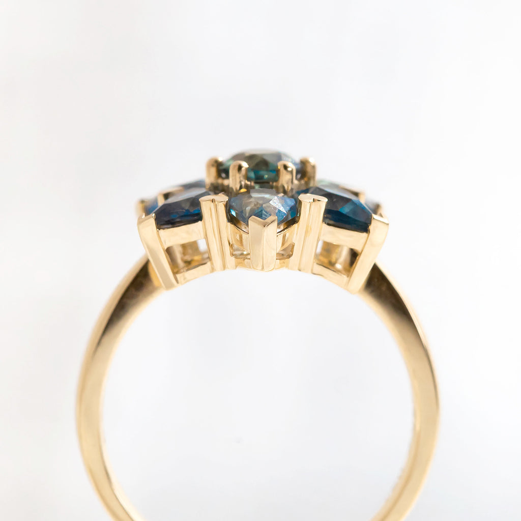 Teal Sapphire Mermaid Flower ring in 19 carat Yellow Gold