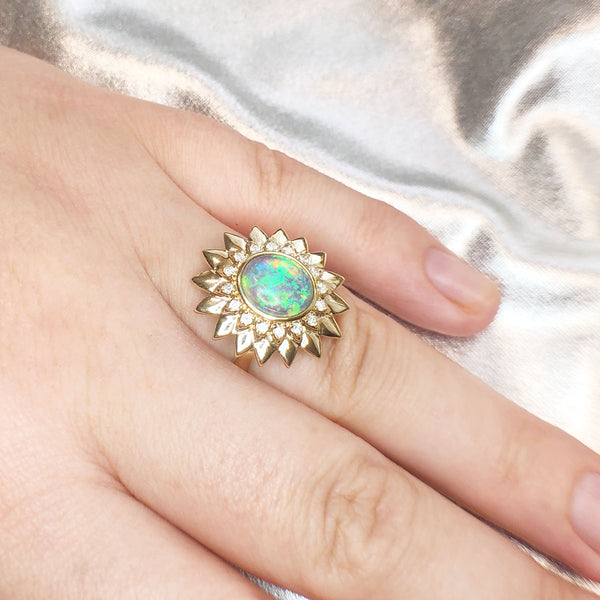 1.3 carat Flashfire Opal Flower ring with Diamonds in 9 carat Yellow Gold