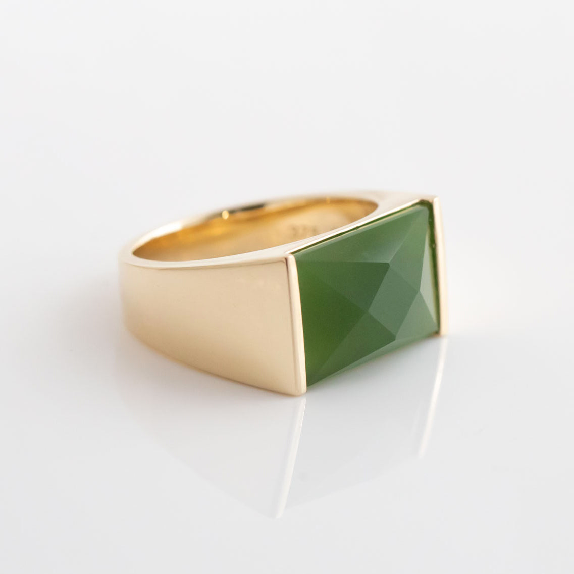 Large Faceted Pounamu Elemental ring in 9 carat Yellow Gold