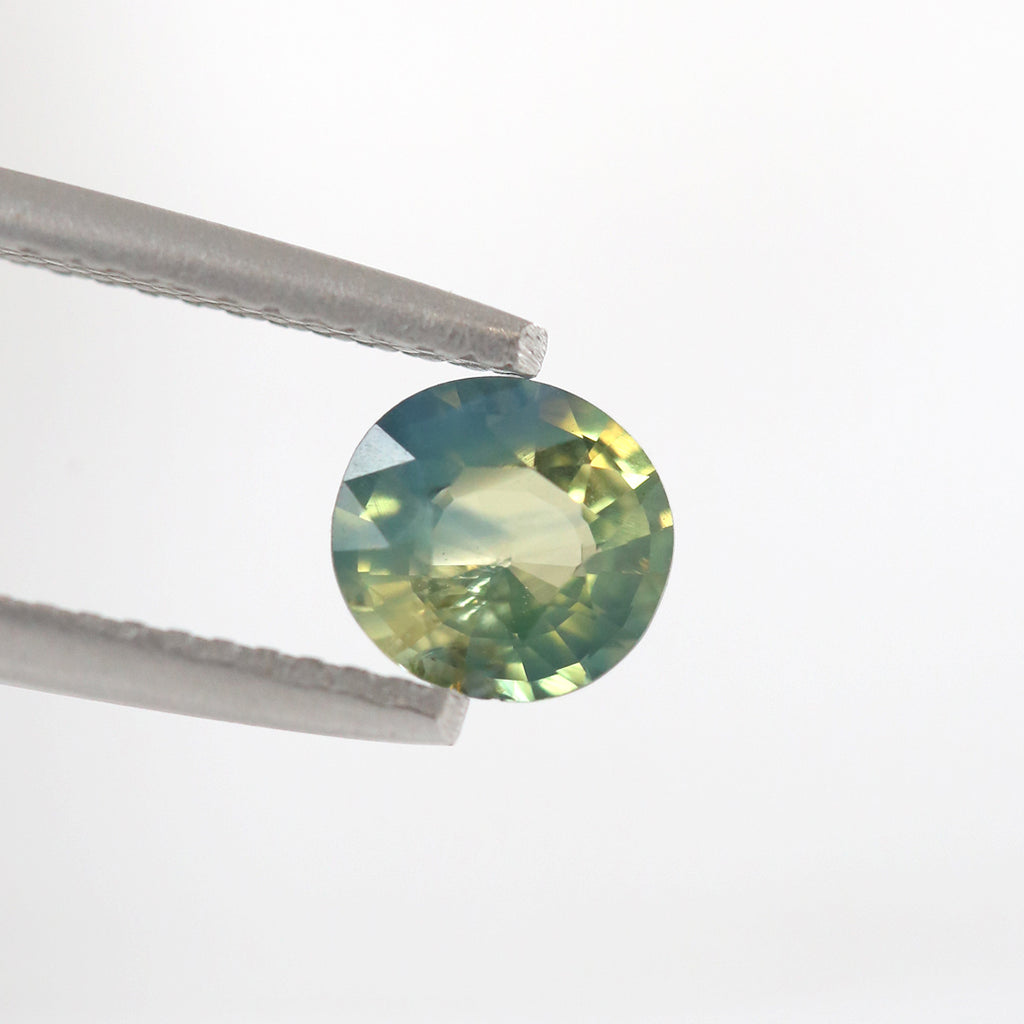 Beautiful Opalescent Green/Yellow/Blue Parti Sapphire Round Faceted cut 1.06 carat