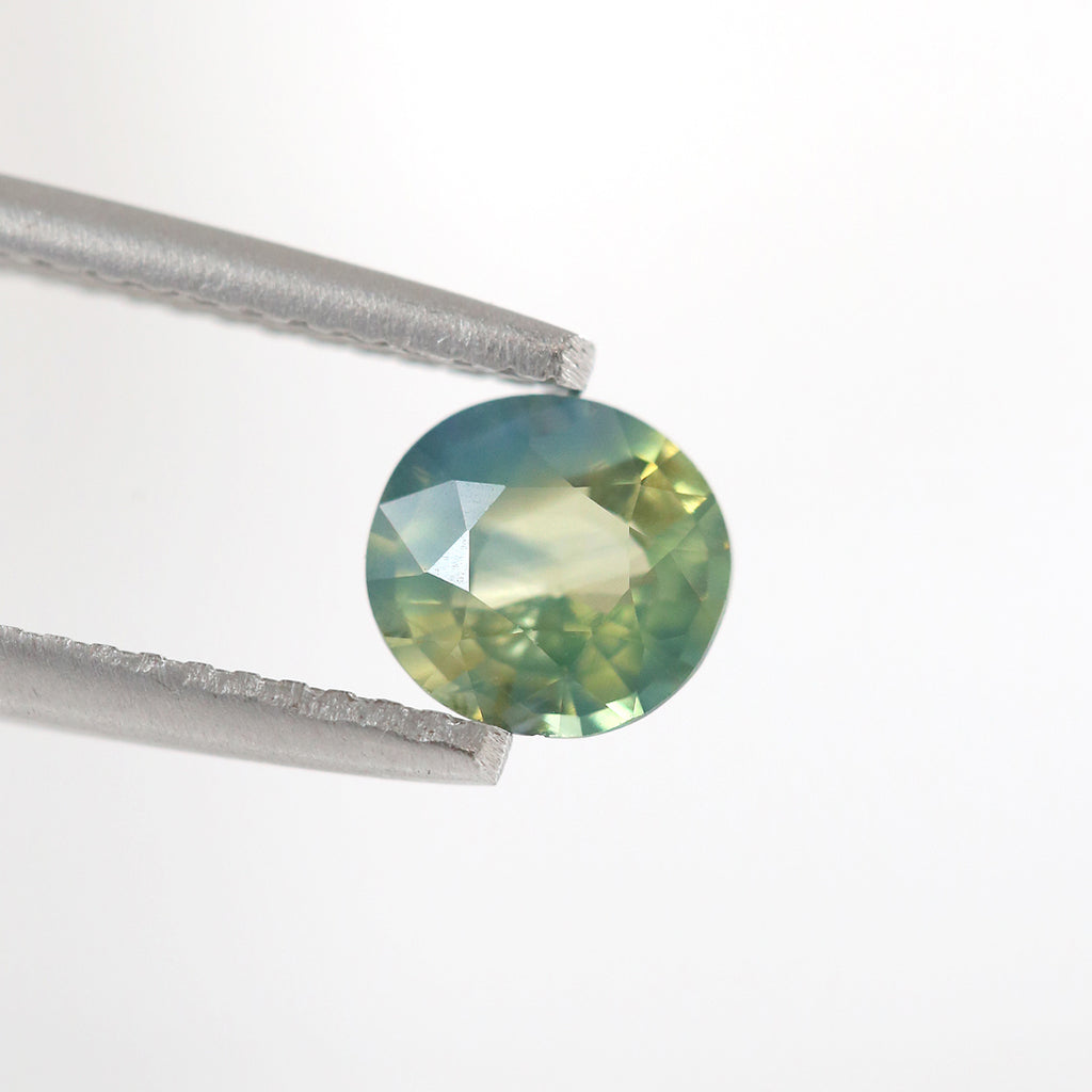 Beautiful Opalescent Green/Yellow/Blue Parti Sapphire Round Faceted cut 1.06 carat