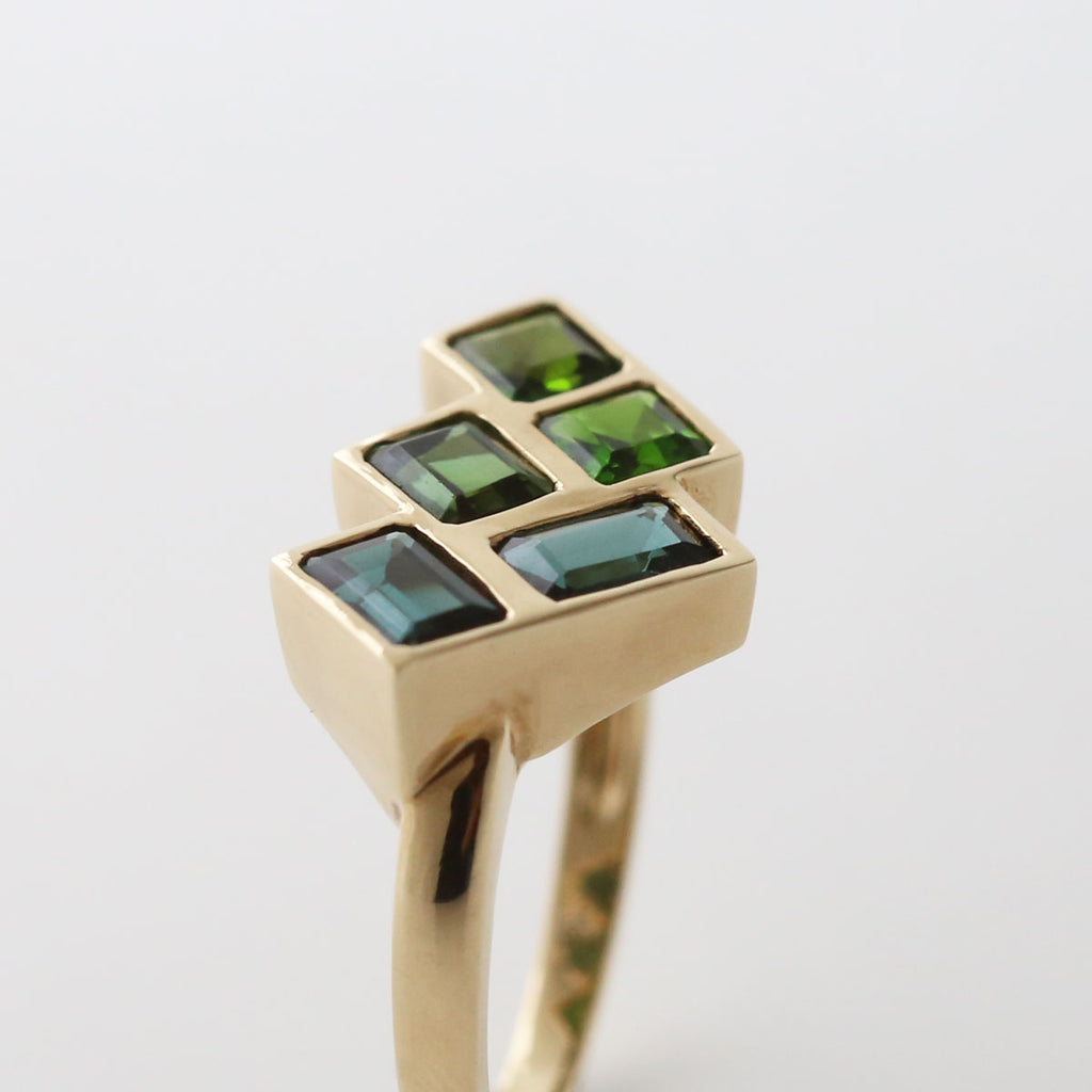 Blue Tourmaline and Siberian Emerald Angled Mosaic ring set in 9 carat Yellow Gold