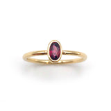 Wine Red Garnet Oval Tiny Treasure Ring in 9 carat Yellow Gold