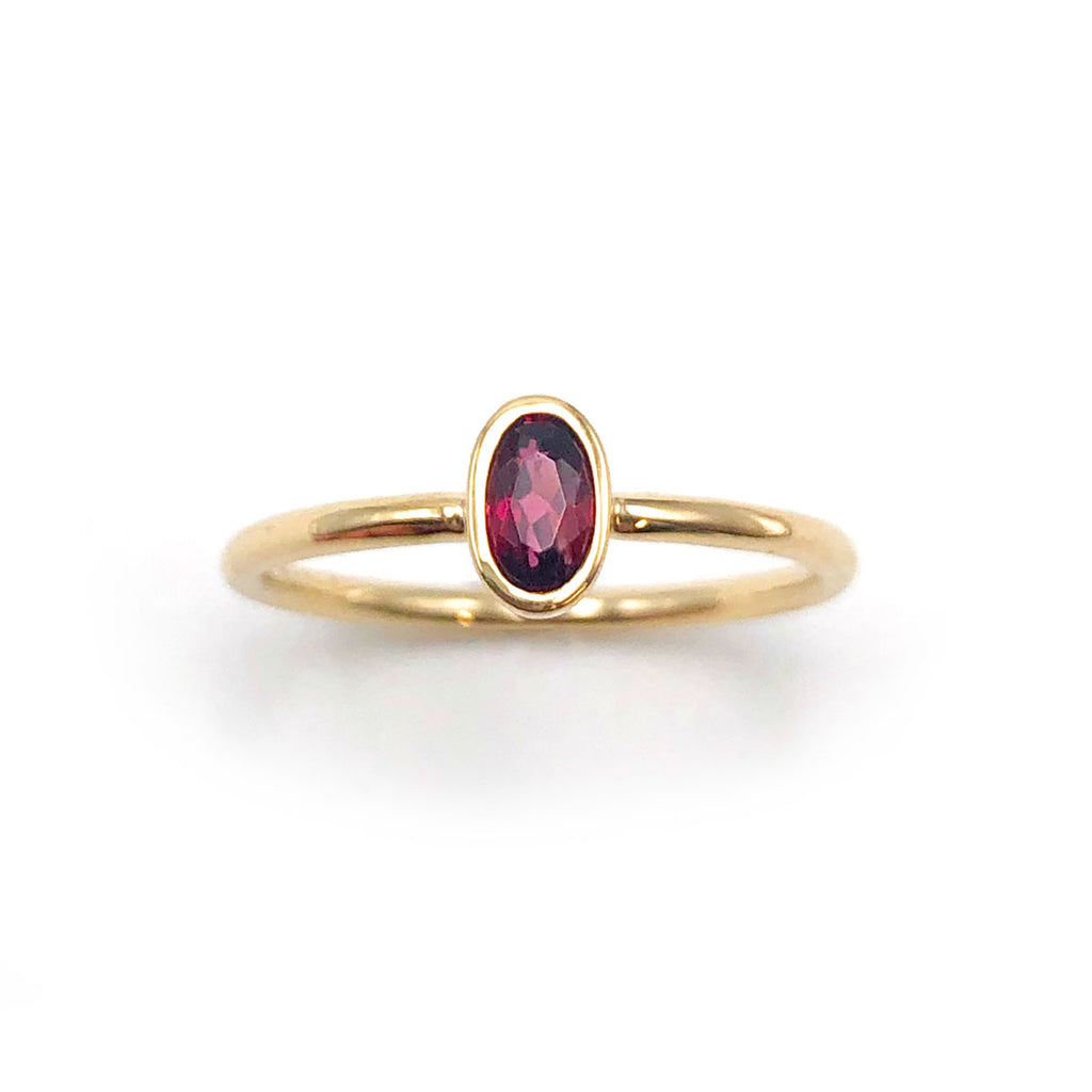 Wine Red Garnet Oval Tiny Treasure Ring in 9 carat Yellow Gold