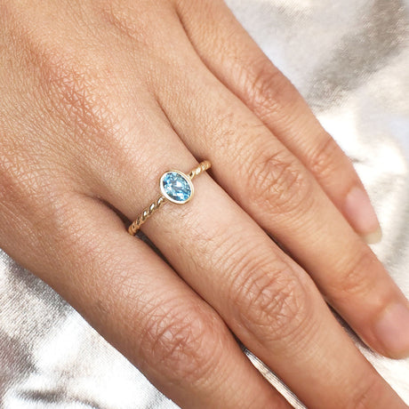 Swiss Blue Topaz Tiny Treasure Ring in 9 carat Yellow Gold