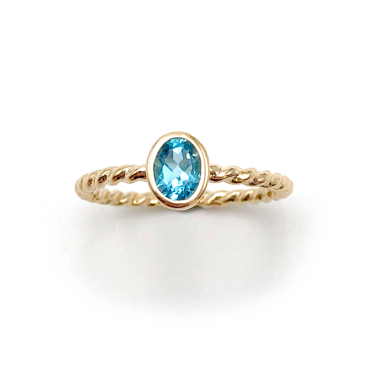 Swiss Blue Topaz Tiny Treasure Ring in 9 carat Yellow Gold