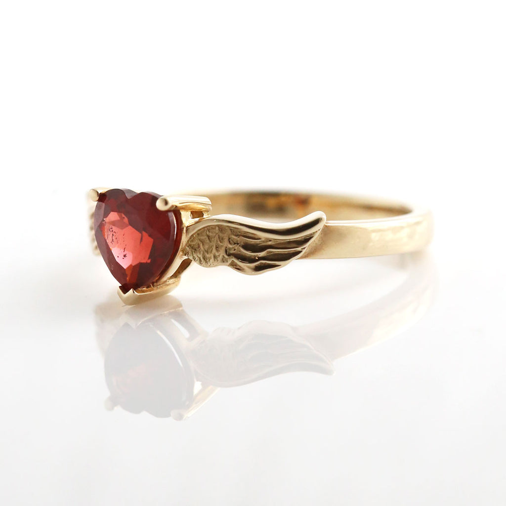 Blood Red Heart with Golden Angel Wings ring in 9 carat Yellow Gold